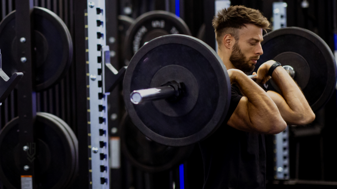 man barbell front squat